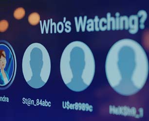 A screen showing four user profiles under the text Whos Watching? with one profile picture and three silhouettes